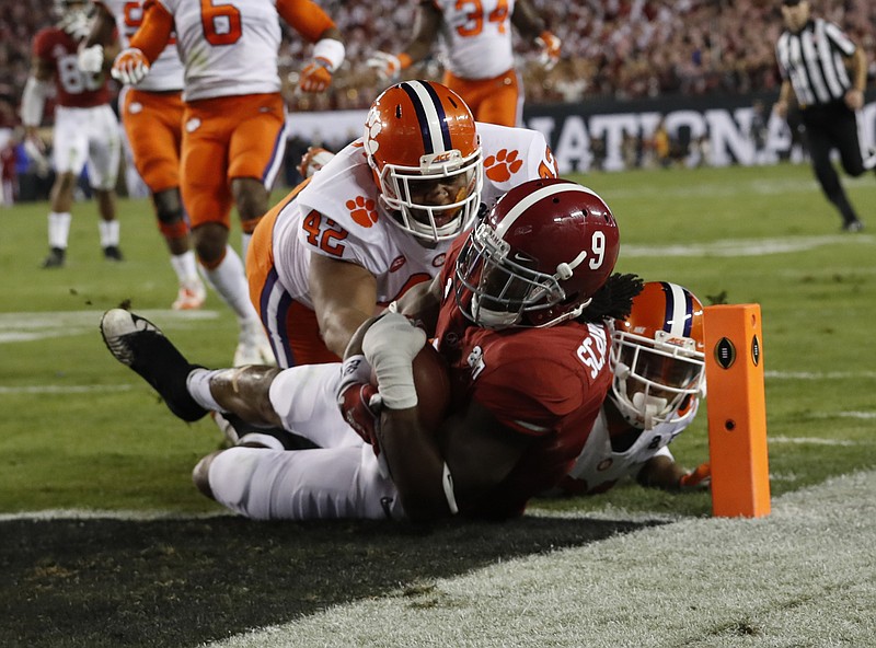 Running back Bo Scarbrough (9) put Alabama up early in last season's national championship game against Clemson, but the Tigers rallied from a 24-14 deficit at the start of the fourth quarter for a 35-31 win.