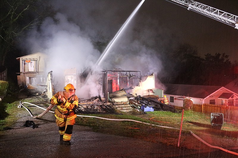 Chattanooga firefighters battle an early morning house a fire Wednesday, Dec. 20, 2017, on the 2600 block of Ocoee Street in Chattanooga. (Photo: Bruce Garner/Chattanooga Fire Department)
