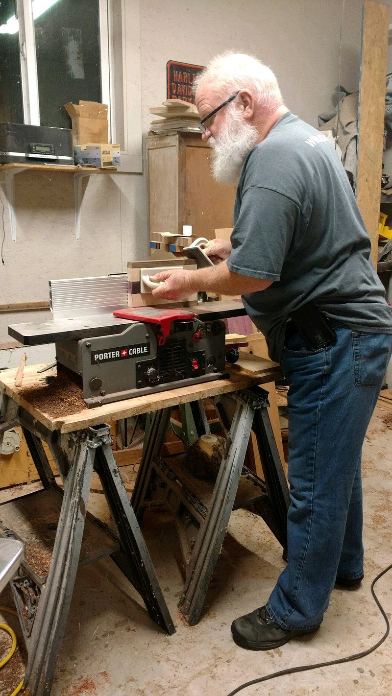 Michael Suggs works on a new wood piece. (Contributed photo)