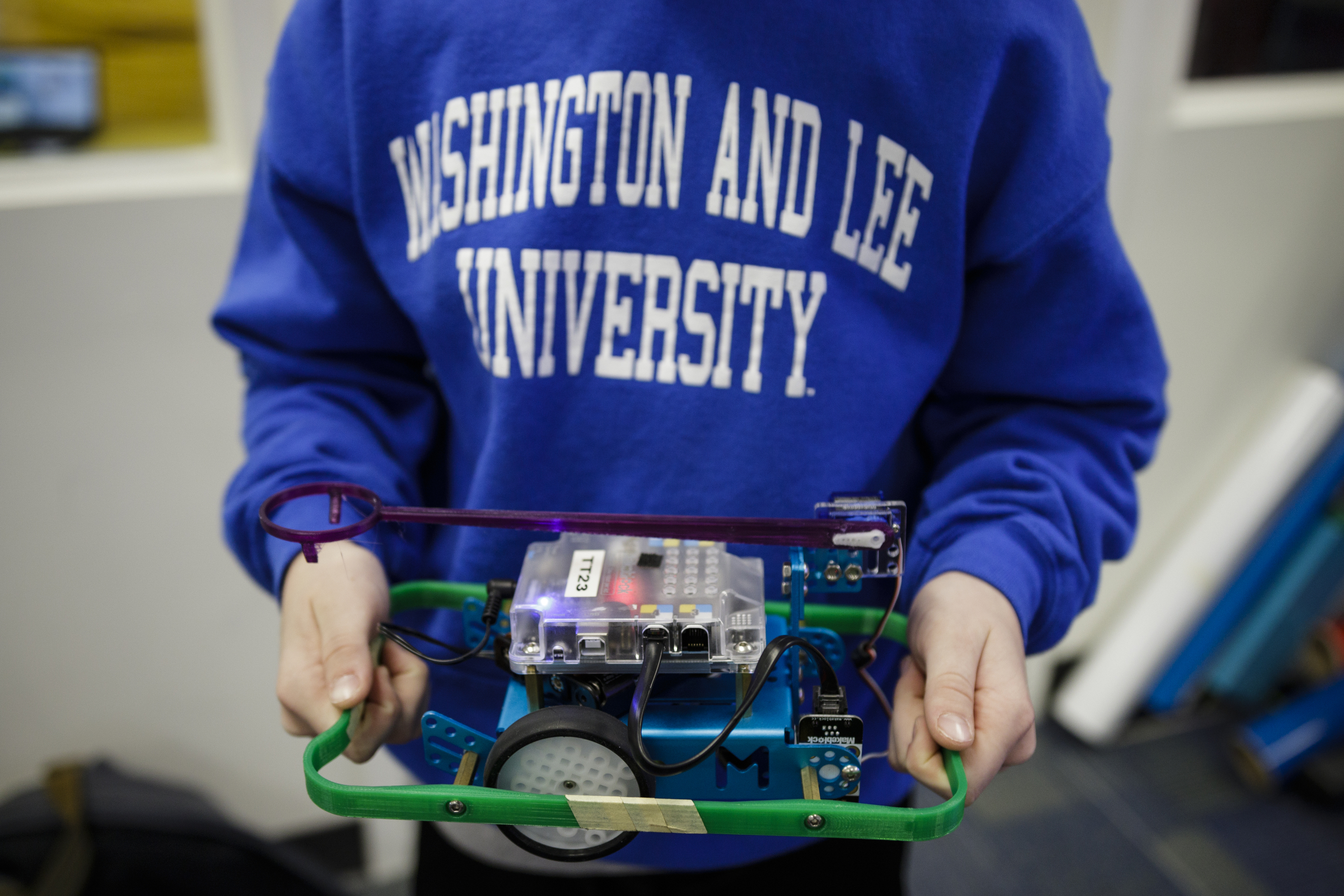 Thomson Lee holds a robot in a robotics class at Tech Town's winter break camp in the Edney Innovation Center on Friday, Dec. 22, 2017, in Chattanooga, Tenn. Tech Town offers technology-centric camps and education for children in subjects ranging from video production and computer coding to electronics and robotics.