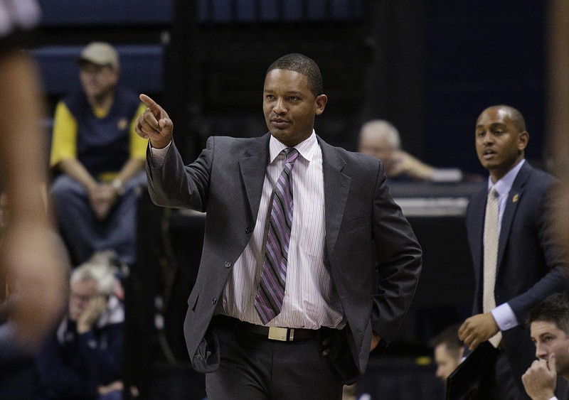 UTC basketball coach Lamont Paris directs players during the Mocs' home basketball game against Georgia State University at McKenzie Arena on Saturday, Dec. 22, 2017, in Chattanooga, Tenn.