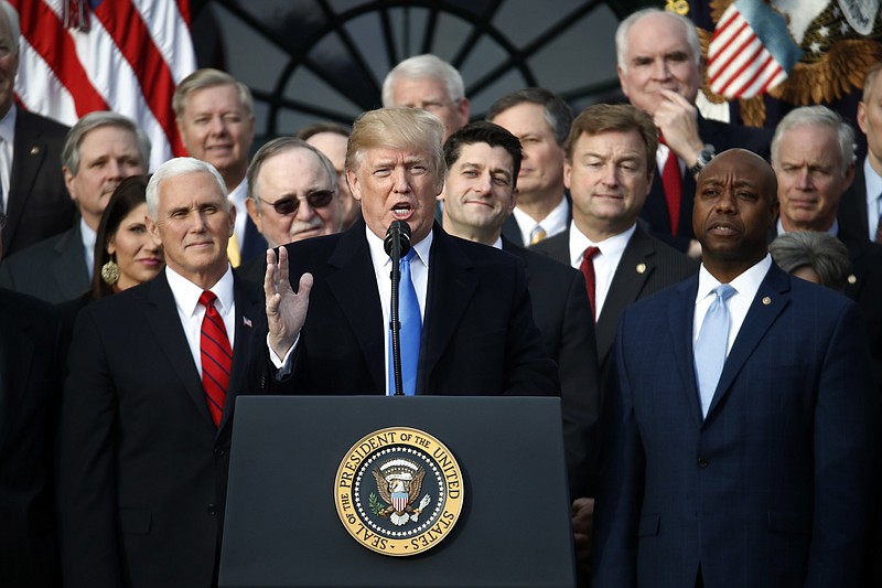 President Donald Trump speaks during a bill passage event on the South Lawn of the White House in Washington last week, acknowledging the final passage of tax overhaul legislation by Congress.