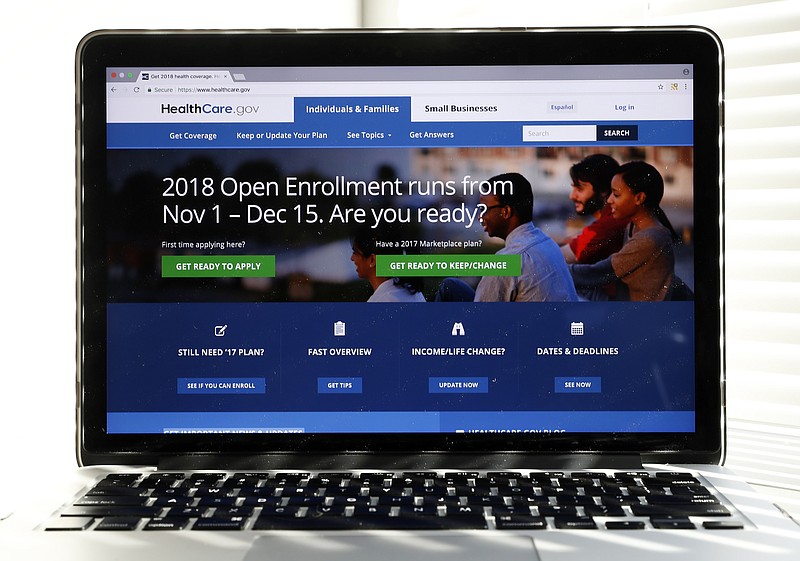 In this Oct. 18, 2017, photo, the Healthcare.gov website is seen on a computer screen in Washington. The government says about 8.8 million people have signed up for coverage next year under the Affordable Care Act. A deadline surge last week appears to account for the surprisingly strong numbers. (AP Photo/Alex Brandon)