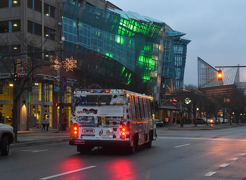 Staff file photo / Electric shuttle buses similar to this vehicle began running in downtown Chattanooga more than 25 years ago.