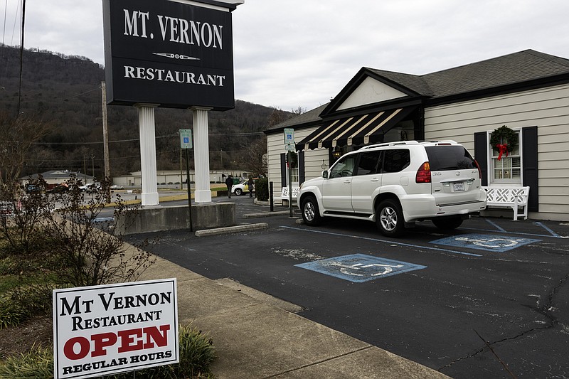 A sign indicates the Mt. Vernon Restaurant on Broad Street is open regular hours, but the doors were locked at lunchtime Wednesday, Dec. 27, and the business has permanently closed, according to its owners.