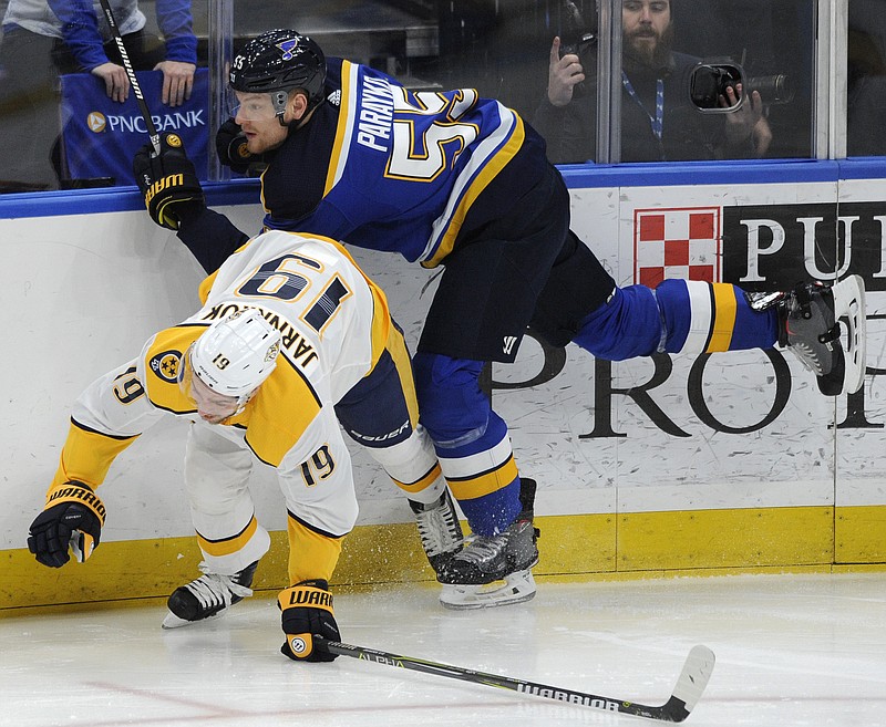 Nashville Predators' Calle Jarnkrok (19), of Sweden, collides with St. Louis Blues' Colton Parayko (55) during the first period of an NHL hockey game, Wednesday, Dec. 27, 2017, in St. Louis. (AP Photo/Bill Boyce)