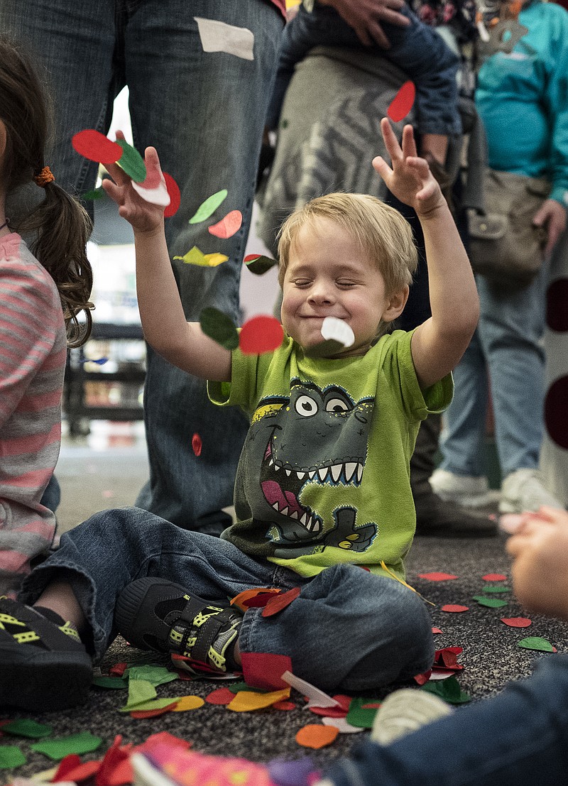 Daelyn Godfrey tosses confetti in the air at last year's New Year's Eve at Noon celebration at the Creative Discovery Museum, 321 Chestnut St. Families can ring in 2018 at the children's museum at 2:18 p.m. today with a visit from Baby New Year and Father Time, crafts, parades, confetti, an apple juice toast and a dance party. The museum is open from 10 a.m. to 4 p.m. For more information, call 423-756-2738 or visit www.cdmfun.org.