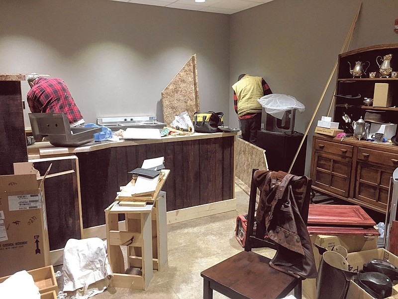 Crews work to complete Hatter's Coffee and Tea inside the LaFayette-Walker County Library. (Contributed photo)