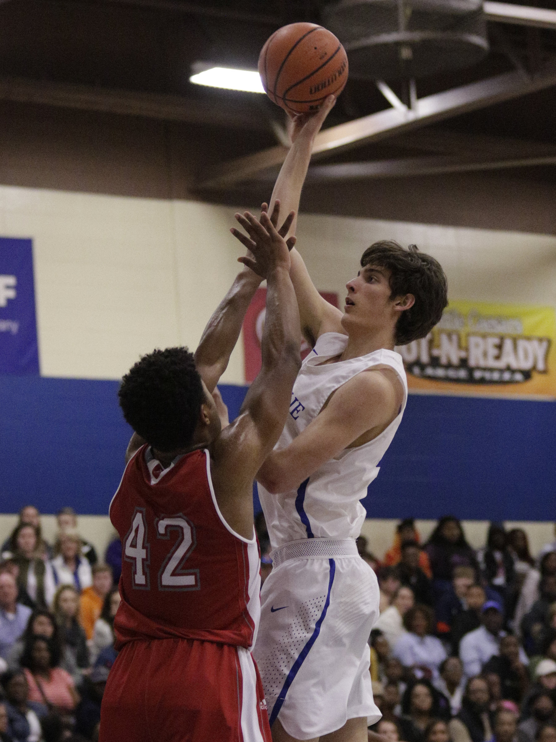 McCallie's Neill Dickey shoots over Baylor's Niko Simpkins during their Times Free Press Best of Preps basketball tournament championship game at Chattanooga State Technical Community College on Saturday, Dec. 30, 2017, in Chattanooga, Tenn.