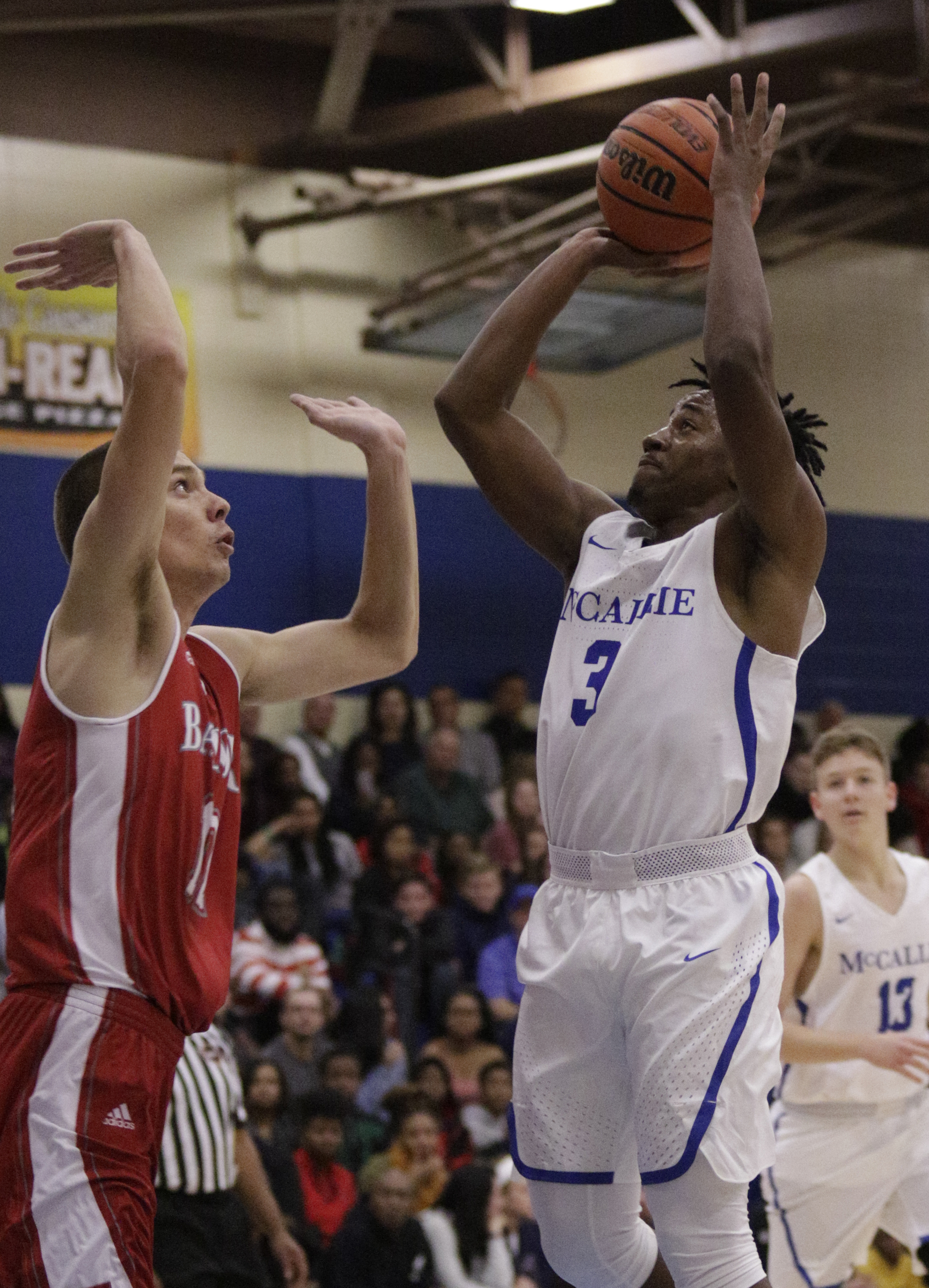 McCallie's Shannon Walker shoots over Baylor's Boris Ristanovic during their Times Free Press Best of Preps basketball tournament championship game at Chattanooga State Technical Community College on Saturday, Dec. 30, 2017, in Chattanooga, Tenn.