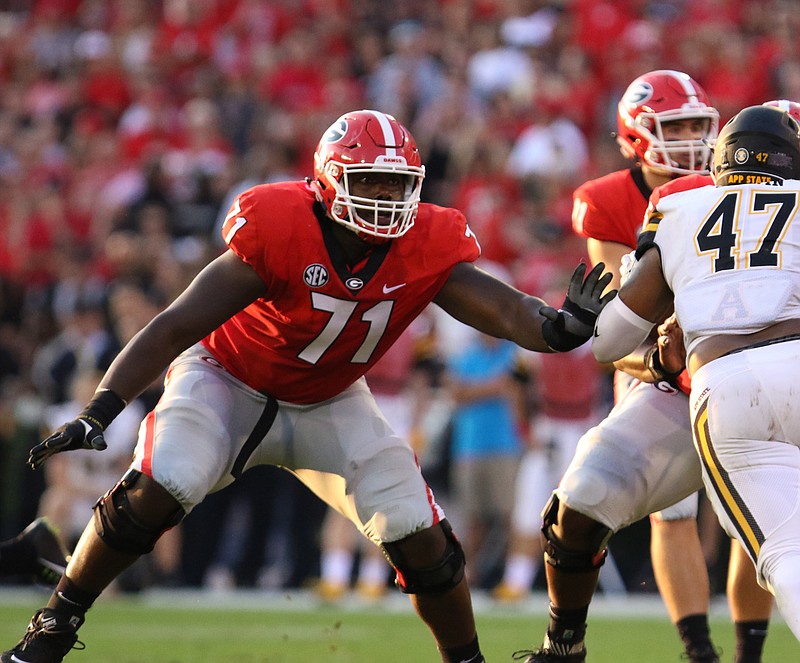 Georgia freshman Andrew Thomas won a starting job at right tackle during preseason camp and has retained it ever since. The Bulldogs (12-1) face Oklahoma (12-1) in Monday's Rose Bowl national semifinal in Pasadena, Calif.