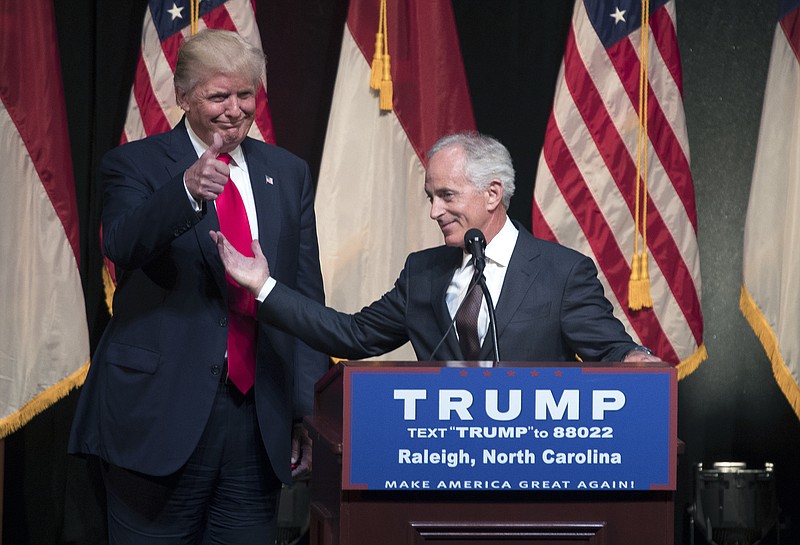 FILE — Sen. Bob Corker (R-Tenn.), right, introduces Donald Trump, then a candidate for president, at a campaign rally in Raleigh, N.C., on July 5, 2016. Now Corker's name is bandied about as a Trump challenger in 2020. (Stephen Crowley/The New York Times)