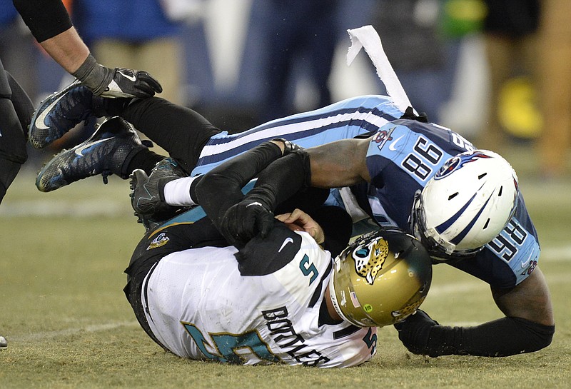Jacksonville Jaguars quarterback Blake Bortles (5) is sacked for a 10-yard loss by Tennessee Titans outside linebacker Brian Orakpo (89) in the second half of an NFL football game Sunday, Dec. 31, 2017, in Nashville, Tenn. (AP Photo/Mark Zaleski)