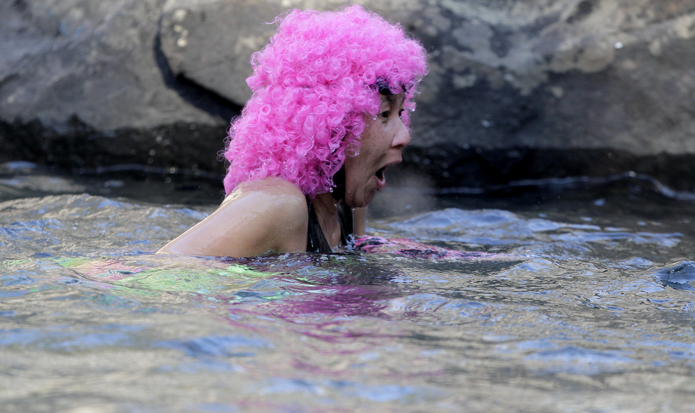 Pearl Pangkey reacts as she gets out of the water during the second annual Lula Lake Polar Plunge at Lula Lake on Monday, Jan. 1, 2018 in Lookout Mountain, Ga. The entrance fee for the Plunge helped fund the event and the on going conservation efforts by the Lula Lake Land Trust.