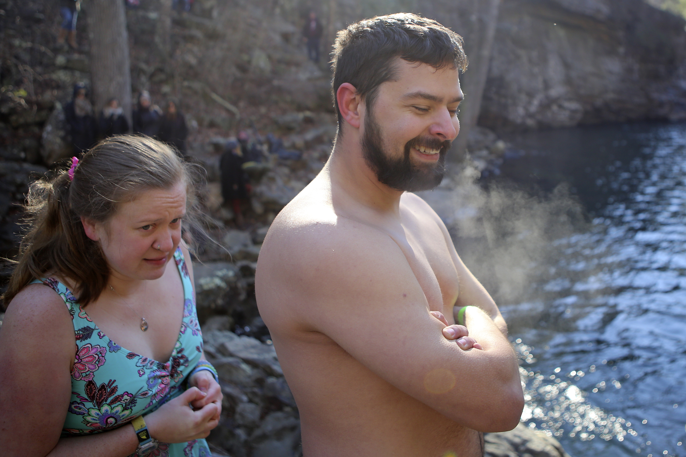 Tallie Williams, left, and Wayne Martin prepare to jump into the water during the second annual Lula Lake Polar Plunge at Lula Lake on Monday, Jan. 1, 2018 in Lookout Mountain, Ga. The entrance fee for the Plunge helped fund the event and the on going conservation efforts by the Lula Lake Land Trust.