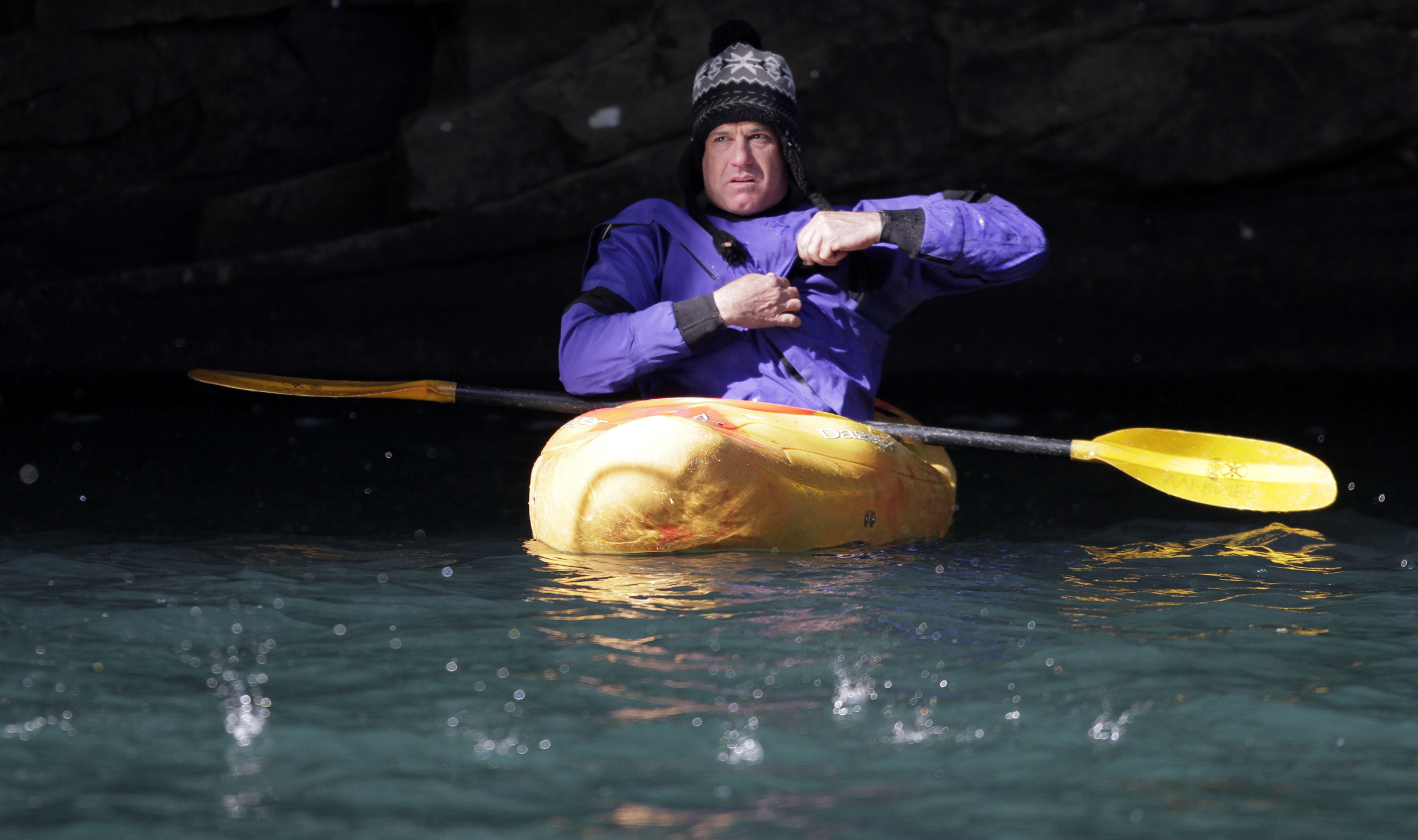 Jose Jimenez floats in a kayak during the second annual Lula Lake Polar Plunge at Lula Lake on Monday, Jan. 1, 2018 in Lookout Mountain, Ga. The entrance fee for the Plunge helped fund the event and the on going conservation efforts by the Lula Lake Land Trust.