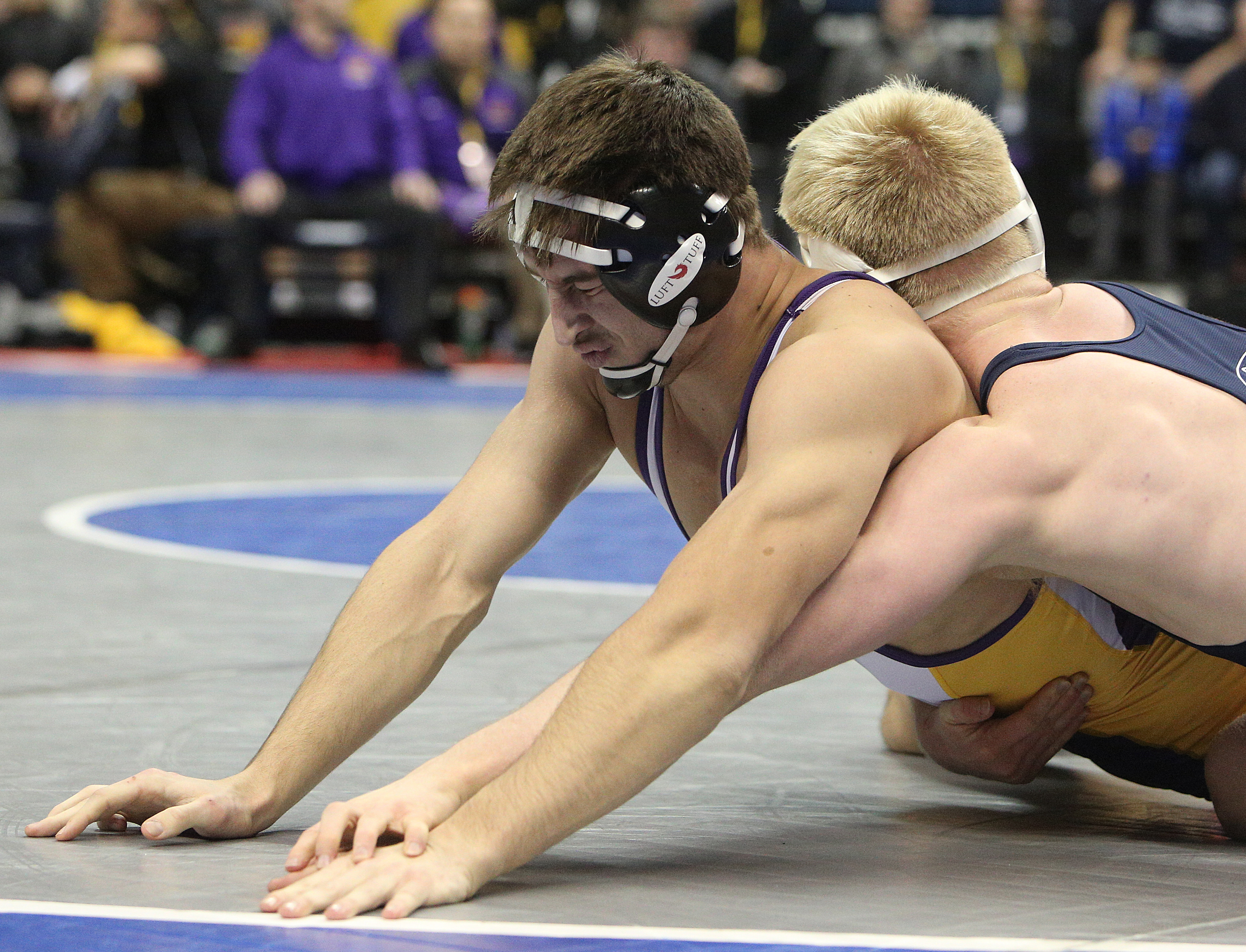 Pennsylvania State University's Bo Nickal, at the right, attempts to pin University of Northern Iowa's Drew Foster during 184 pound bracket of the Southern Scuffle College Wrestling Tournament Tuesday, Jan. 2, 2018 at McKenzie Arena at UTC in Chattanooga, Tenn. Nickal won the match making him the winner of the 184 pound bracket.