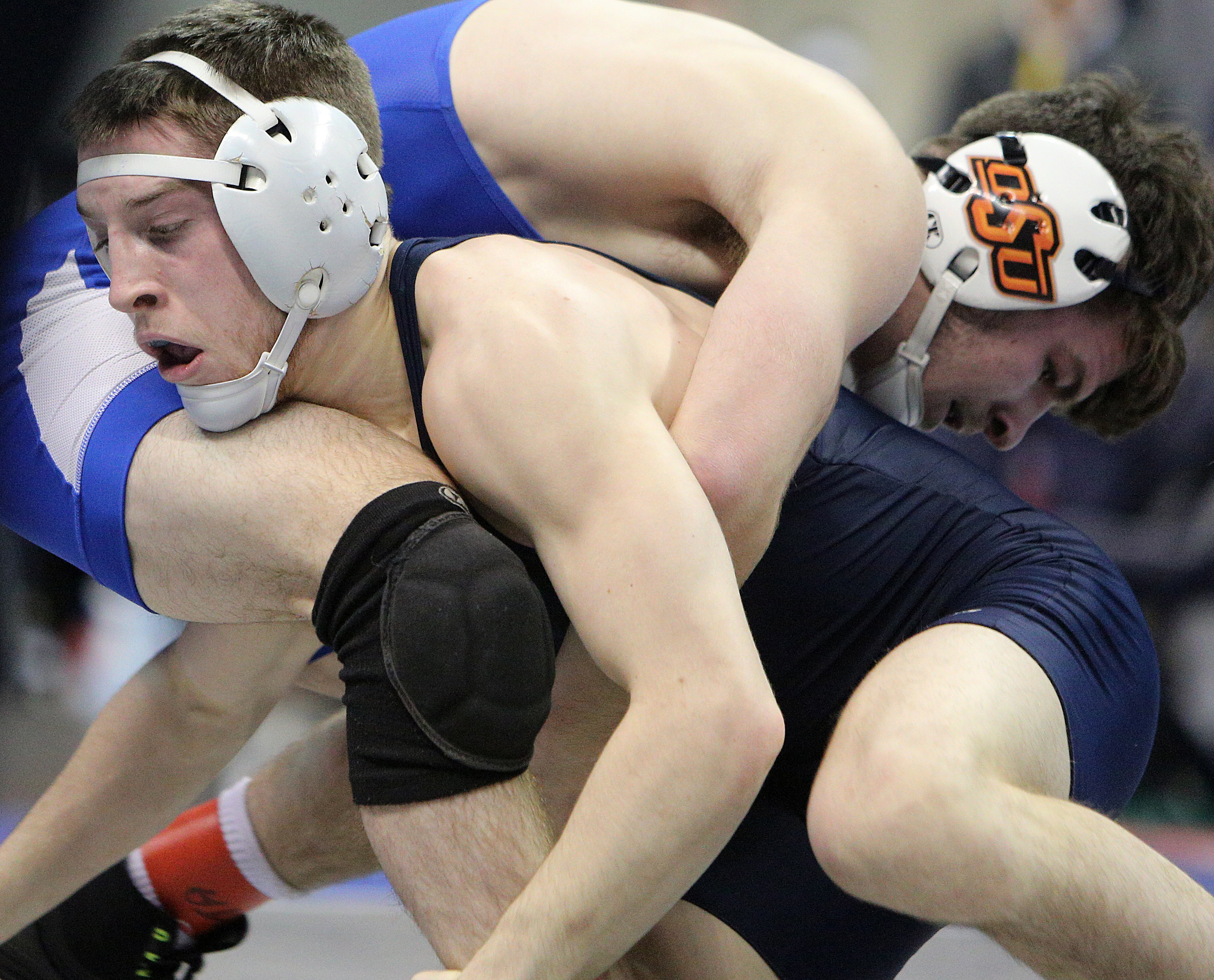 Oklahoma State University's Kaden Gfeller grapples with Pennsylvania State University's Nick Lee during the Southern Scuffle College Wrestling Tournament Tuesday, Jan. 2, 2018 at McKenzie Arena at UTC in Chattanooga, Tenn. Gfeller placed first in the 141 pound bracket and Lee came in second.