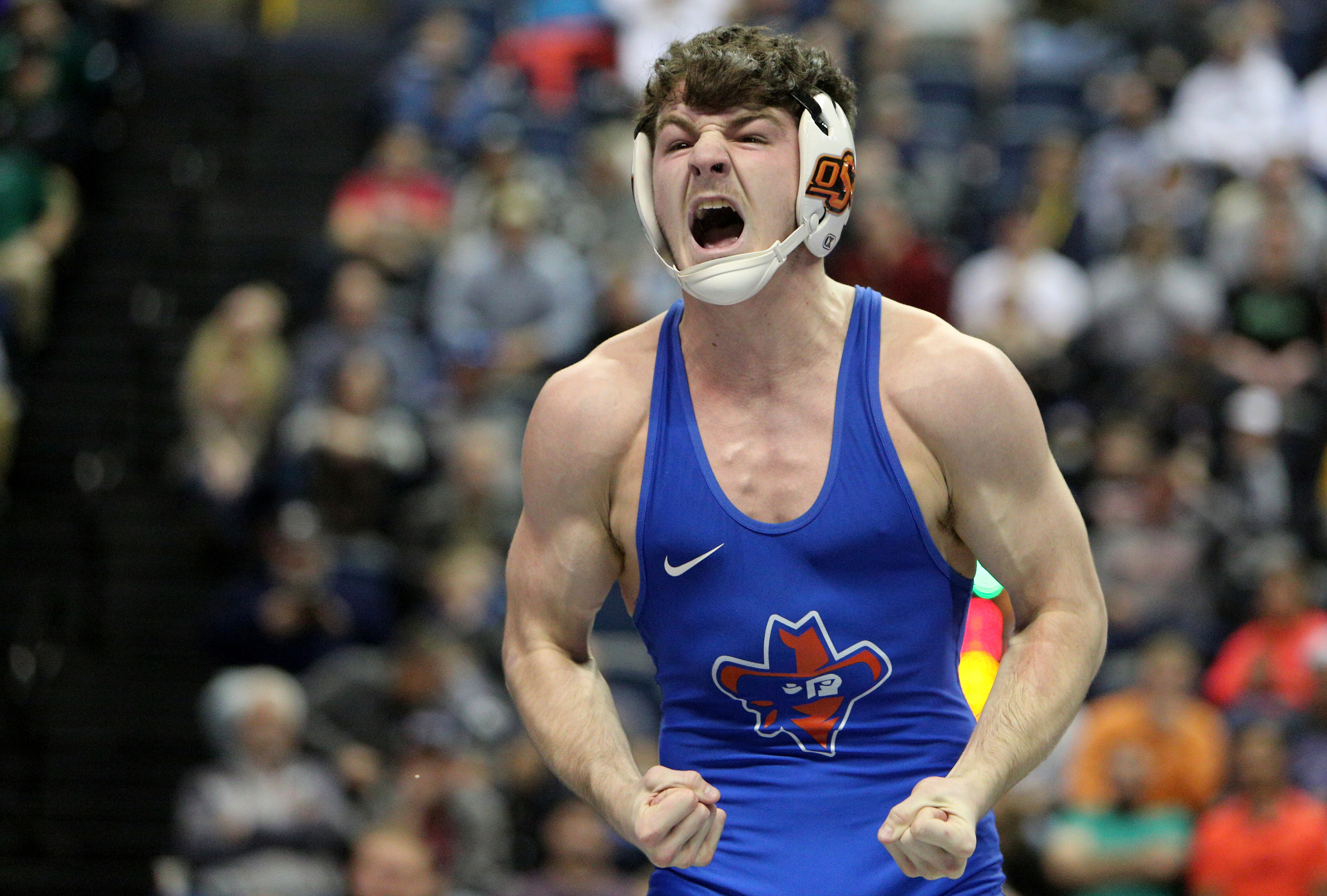 Oklahoma State University's Kaden Gfeller reacts after winning against Pennsylvania State University's Nick Lee during the Southern Scuffle College Wrestling Tournament Tuesday, Jan. 2, 2018 at McKenzie Arena at UTC in Chattanooga, Tenn. Gfeller placed first in the 141 pound bracket and Lee came in secondf.