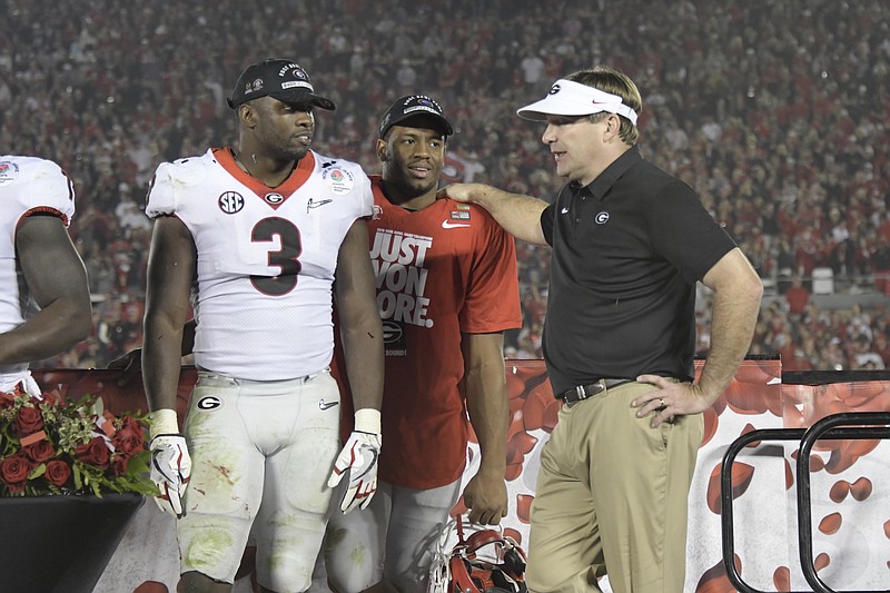 Georgia football coach Kirby Smart visits with linebacker Roquan Smith, left, and running back Nick Chubb after Monday night's 54-48 double-overtime victory over Oklahoma in the Rose Bowl.