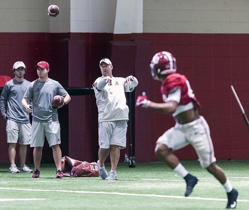 Alabama defensive coordinator Jeremy Pruitt works linebacker VanDarius Cowan (43) during football practice, Thursday, Dec. 21, 2017, at the Hank Crisp Indoor Facility in Tuscaloosa, Ala. (Vasha Hunt/AL.com via AP)