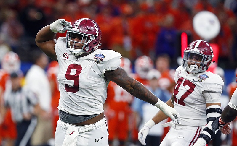 Alabama defensive lineman Da'Shawn Hand (9) celebrates his sack in the second half of the Sugar Bowl semi-final playoff game against Clemson for the NCAA college football national championship, in New Orleans, Monday, Jan. 1, 2018. (AP Photo/Butch Dill)