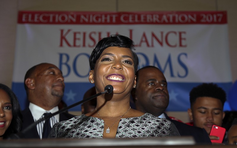 In this Dec. 6, 2017, file photo, Atlanta mayoral candidate Keisha Lance Bottoms talks during an election-night watch party in Atlanta. Bottoms, Atlanta's new mayor, will be sworn into office during a ceremony at Morehouse College on Tuesday, Jan. 2, 2018. (AP Photo/John Bazemore, File)