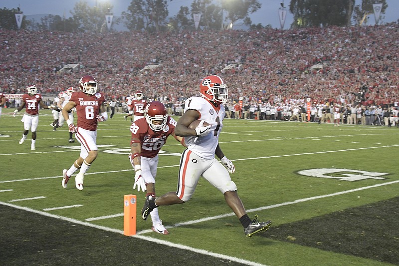 Georgia senior tailback Sony Michel scores one of his three touchdowns during Monday's 54-48 win over Oklahoma in double overtime at the Rose Bowl.