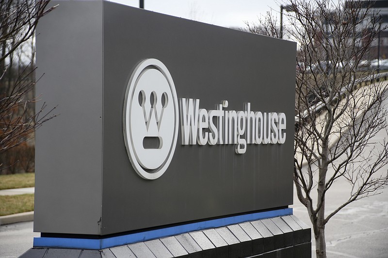 FILE - This Wednesday, March 29, 2017, file photo, shows a sign at the entrance to Westinghouse International Headquarters in Cranberry, Pa. Brookfield Business Partners is buying the Toshiba nuclear unit Westinghouse Electric. Westinghouse filed for bankruptcy protection in March 2017. The transaction is expected to close in the third quarter of 2018. (AP Photo/Keith Srakocic, File)