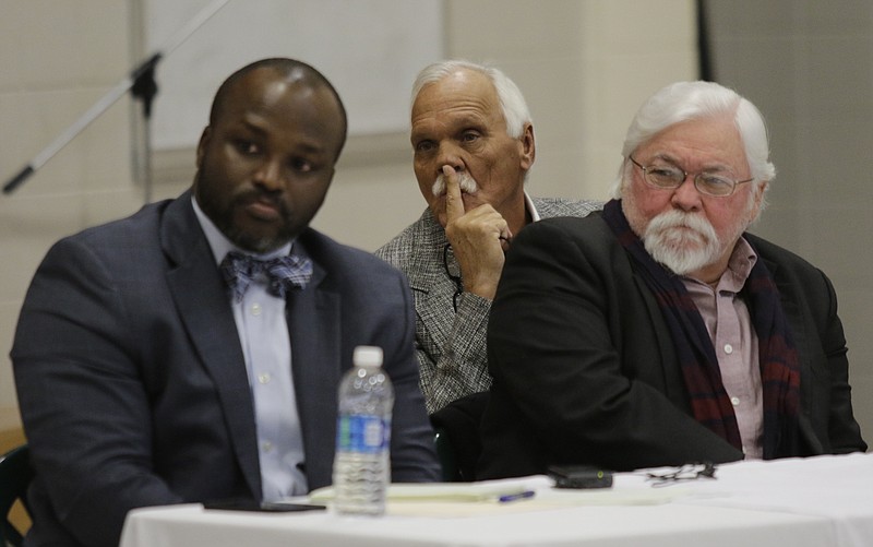 Schools superintendent Bryan Johnson, left, and boardmembers Joe Smith, center, and David Testerman listen during a meeting between the Signal Mountain Town Council and the Hamilton County Board of Education at Nolan Elementary on Thursday, Jan. 4, 2018, in Signal Mountain, Tenn. Signal Mountain officials and members of the board discussed the town's consideration of splitting from the Hamilton County school system to form their own independent district.