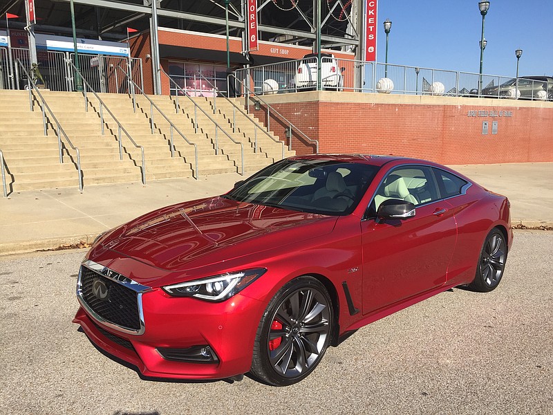 The 2018 Infiniti Q60 Red Sport 400 is shown in vibrant Dynamic Sunston paint. (Staff Photo by Mark Kennedy)