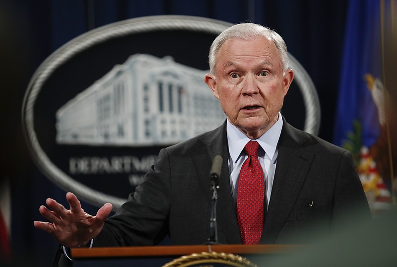 
              FILE - In this Dec. 15, 2017 file photo, Attorney General Jeff Sessions speaks during a news conference at the Justice Department in Washington.  Sessions on Friday launched a review of a little-known but widely used practice of immigration judges closing cases without decisions, potentially reshaping immigration courts and putting hundreds of thousands of people in greater legal limbo.  (AP Photo/Carolyn Kaster)
            