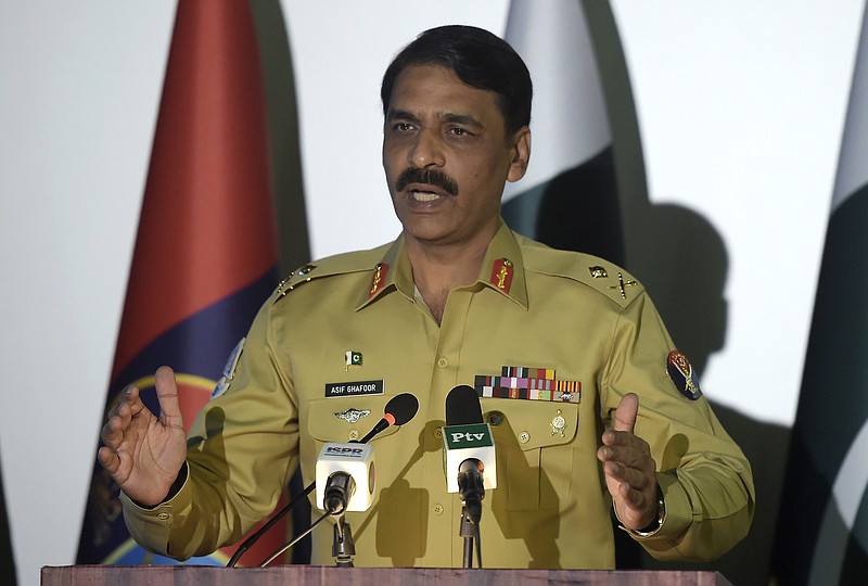 In this Monday, April 17, 2017, file photo, Pakistan's army spokesman Maj. Gen. Asif Ghafoor addresses a news conference in Rawalpindi, Pakistan. Ghafoor told that Pakistan wants to continue cooperation with the U.S. but will not "compromise on national interests and prestige." (AP Photo/Anjum Naveed)