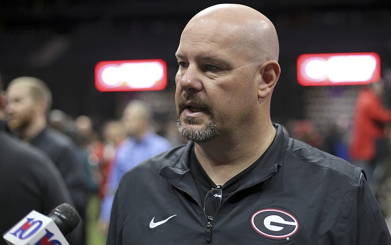 Georgia outside linebackers coach Kevin Sherrer talks to reporters Saturday in a media event previewing Monday night's championship game of the College Football Playoff in Atlanta.