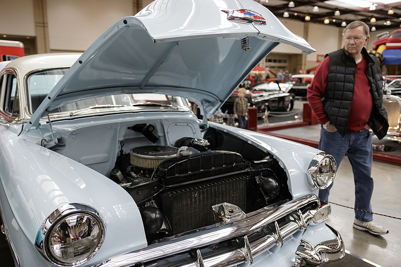 Paul Johnson looks at a 1954 Chevrolet 350 on display at the 50th Anniversary of the World of Wheels at the Chattanooga Convention Center on Saturday, Jan. 6, 2018, in Chattanooga, Tenn. The event, which showcases classic and modern automobiles, continues Sunday from 11 a.m. to 6 p.m.