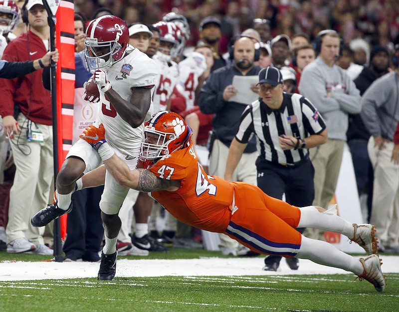 Alabama wide receiver Calvin Ridley (3) is tackled by Clemson linebacker James Skalski (47) in the first half of the Sugar Bowl semi-final playoff game for the NCAA college football national championship, in New Orleans, Monday, Jan. 1, 2018. (AP Photo/Butch Dill)