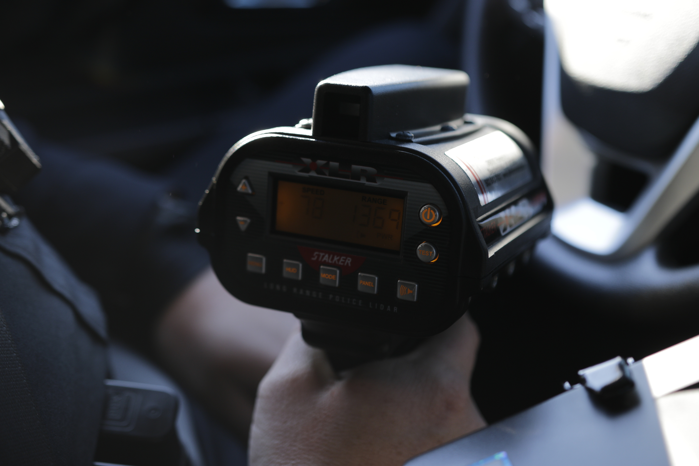 Officer Chris Mullinix uses a laser-assisted radar gun to look for speeding vehicles on Interstate 75 while on traffic patrol on Friday, Jan. 5, 2018, in Chattanooga, Tenn.