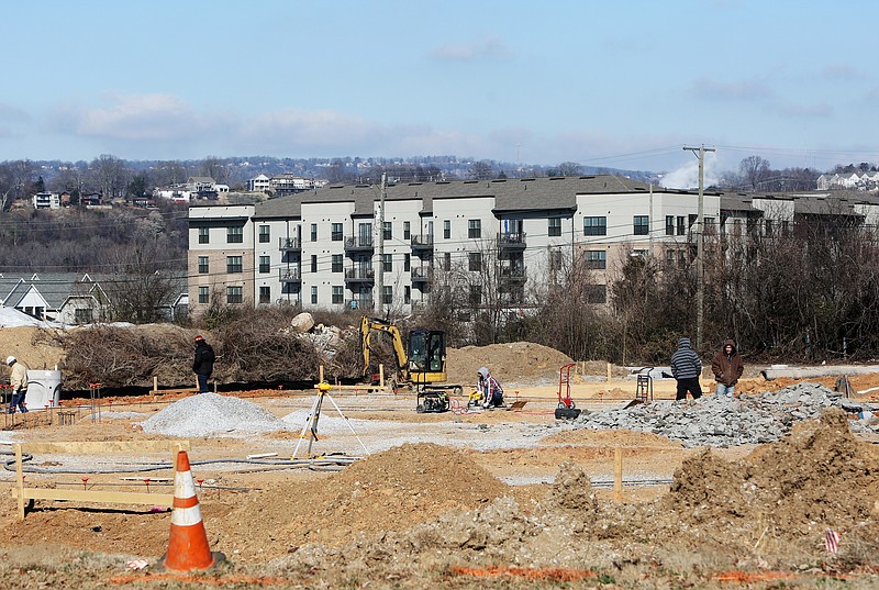 Construction is underway at the corner of Riverfront Parkway and West Ninth Avenue Thursday, Jan. 4, 2018 in Chattanooga, Tenn. There will be a public hearing Monday on the plan to use tax money to expand M.L. King Boulevard straight across Riverfront parkway to the Blue Goose Hallow trailhead, which will replace West Ninth Avenue. 