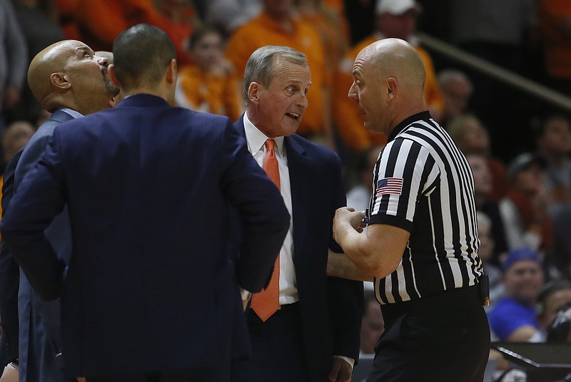 Tennessee head coach Rick Barnes talks with a referee during the second half of an NCAA college basketball game against Kentucky on Saturday, Jan. 6, 2018, in Knoxville, Tenn. (AP Photo/Crystal LoGiudice)