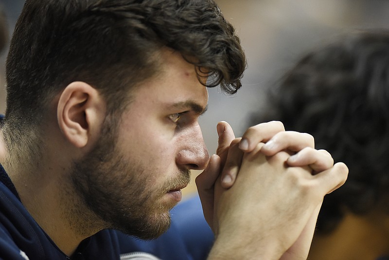 Ramon Vila, a recent transfer to UTC, watches Saturday's home men's basketball game against ETSU from the bench. The former Arizona State player is enrolled but will not be eligible to play until after the first semester of the 2018-19 school year.