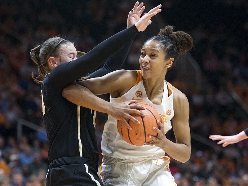 Tennessee's Jaime Nared is defended by Vanderbilt's Cierra Walker during an NCAA college basketball game in Knoxville, Tenn., on Sunday, Jan. 7, 2018. (Saul Young/Knoxville News Sentinel via AP)