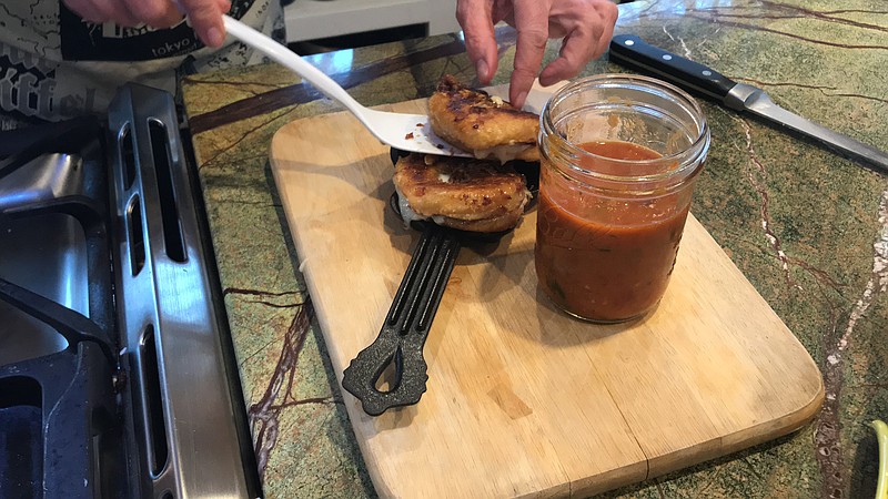 It sounds crazy, and that's the point, but we made a bacon/maple-syrup grilled cheese doughnut with tomato basil soup.