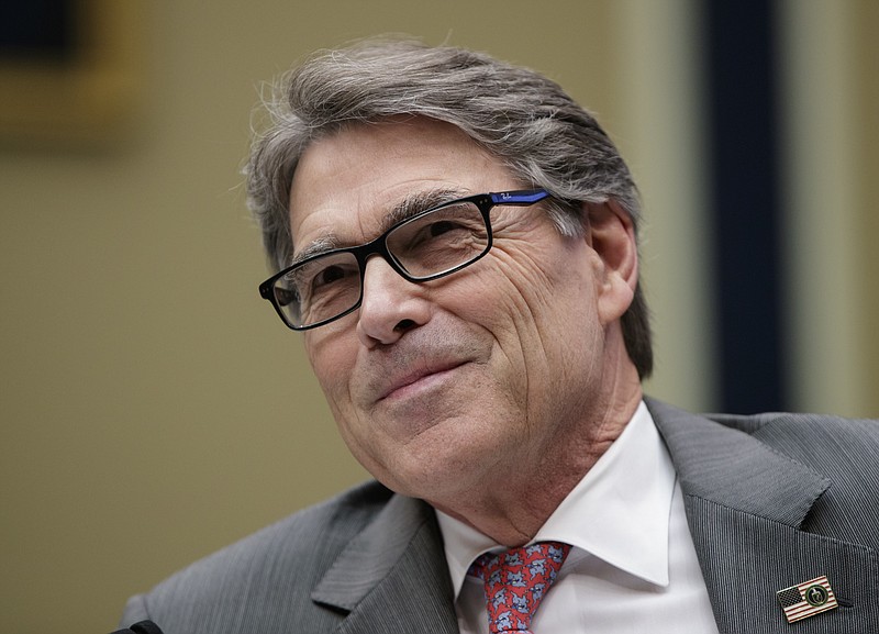 FILE - In this Oct. 12, 2017, file photo,Energy Secretary Rick Perry listens during a hearing about the electrical grid, on Capitol Hill in Washington. The Federal Energy Regulatory Commission on Jan. 8, 2018, rejected a Trump administration plan to bolster coal-fired and nuclear power plants, dealing a blow to President Donald Trump's efforts to boost the struggling coal industry. Perry thanked the panel for addressing his proposal, which he said had initiated a national debate on the resiliency of the nation’s electric system.(AP Photo/J. Scott Applewhite, File)