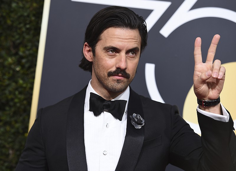 
              Milo Ventimiglia arrives at the 75th annual Golden Globe Awards at the Beverly Hilton Hotel on Sunday, Jan. 7, 2018, in Beverly Hills, Calif. (Photo by Jordan Strauss/Invision/AP)
            