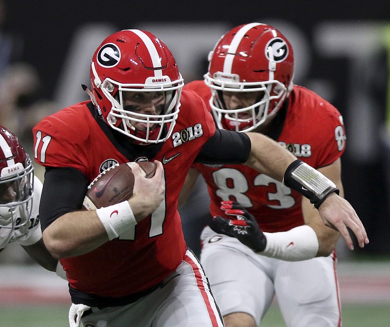 Georgia quarterback Jake Fromm (11) rushes against Alabama during the College Football Playoff national championship at Mercedes-Benz Stadium on Monday, Jan. 8, 2018, in Atlanta, Ga.