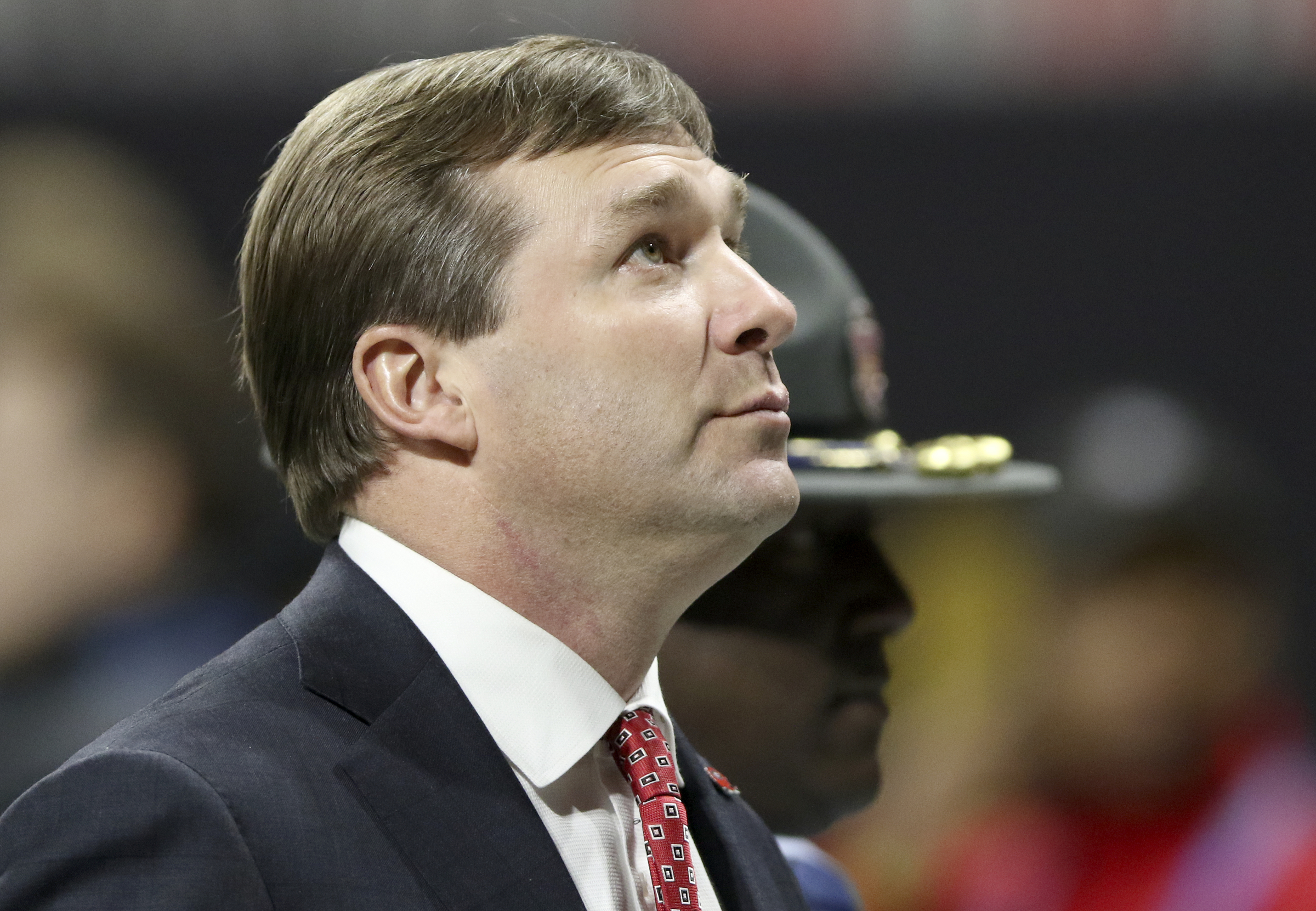 Georgia head coach Kirby Smart looks up as he walks off the field prior to warming up for the College Football Playoff national championship against Alabama at Mercedes-Benz Stadium on Monday, Jan. 8, 2018 in Atlanta, Ga.