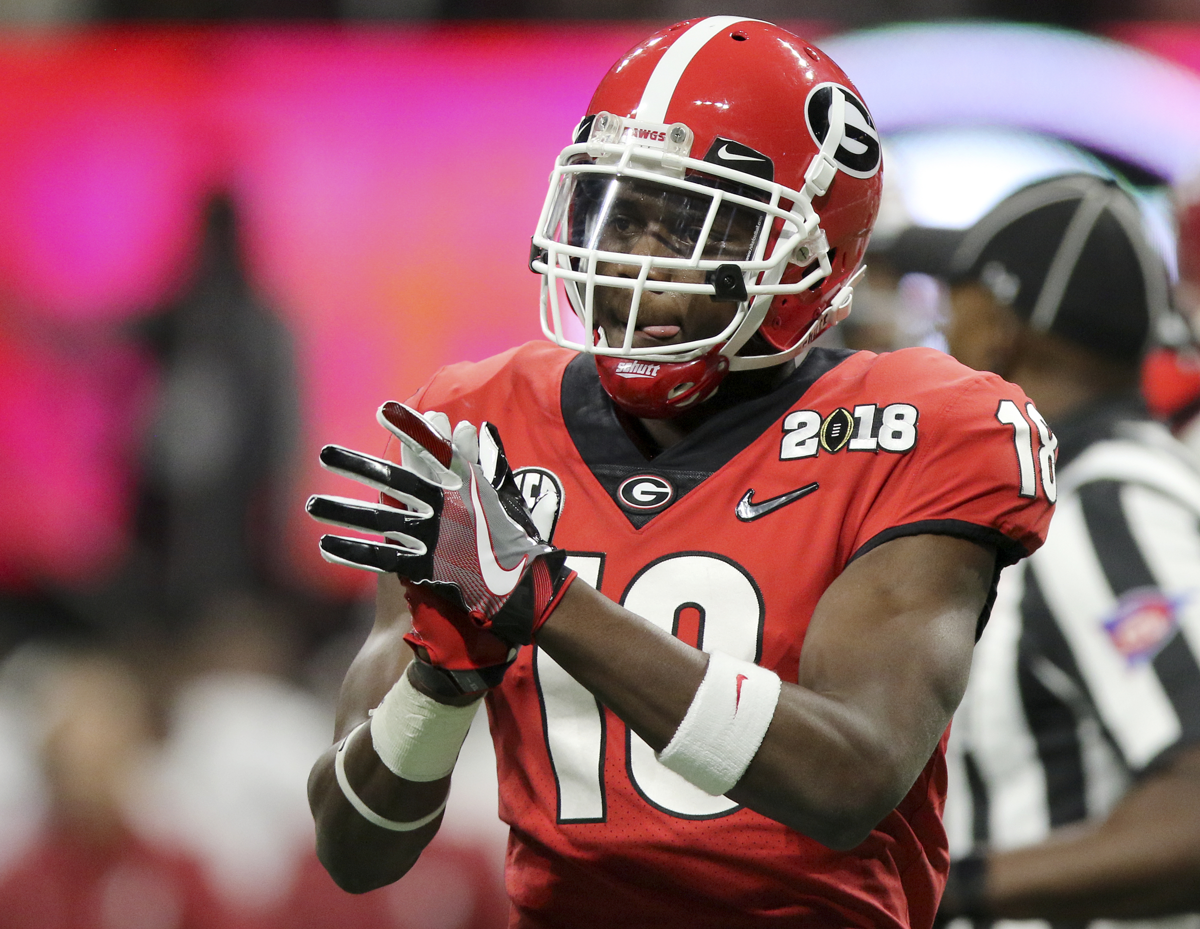 Georgia defensive back Deandre Baker (18) claps after a false start penalty was called on Alabama on fourth down during the College Football Playoff national championship at Mercedes-Benz Stadium on Monday, Jan. 8, 2018 in Atlanta, Ga. The penalty on Alabama would backed up their field goal try by five yards and was subsequently missed.