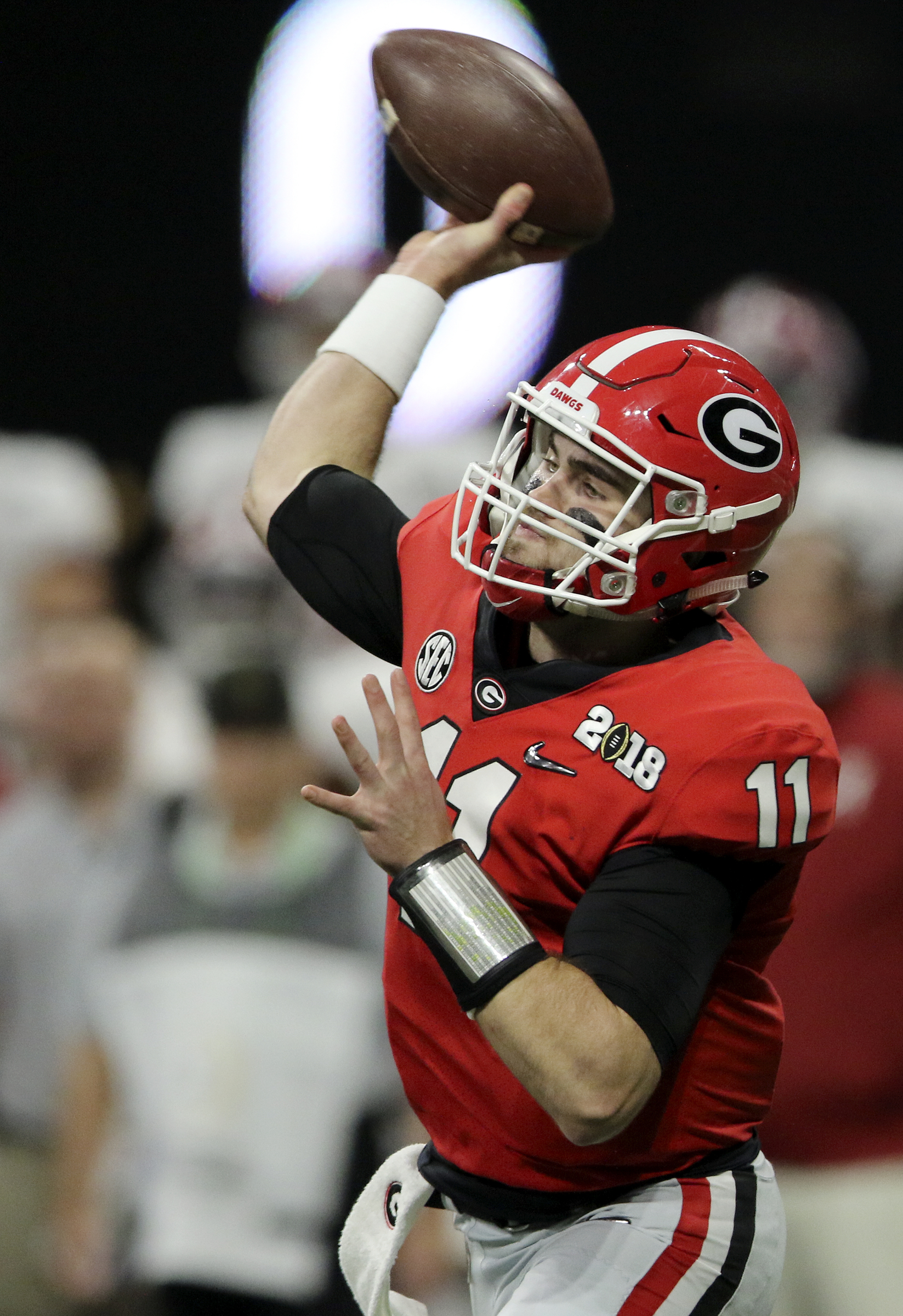 Georgia quarterback Jake Fromm (11) throws a pass, which would be incomplete, against Alabama in the College Football Playoff national championship at Mercedes-Benz Stadium on Monday, Jan. 8, 2018 in Atlanta, Ga.