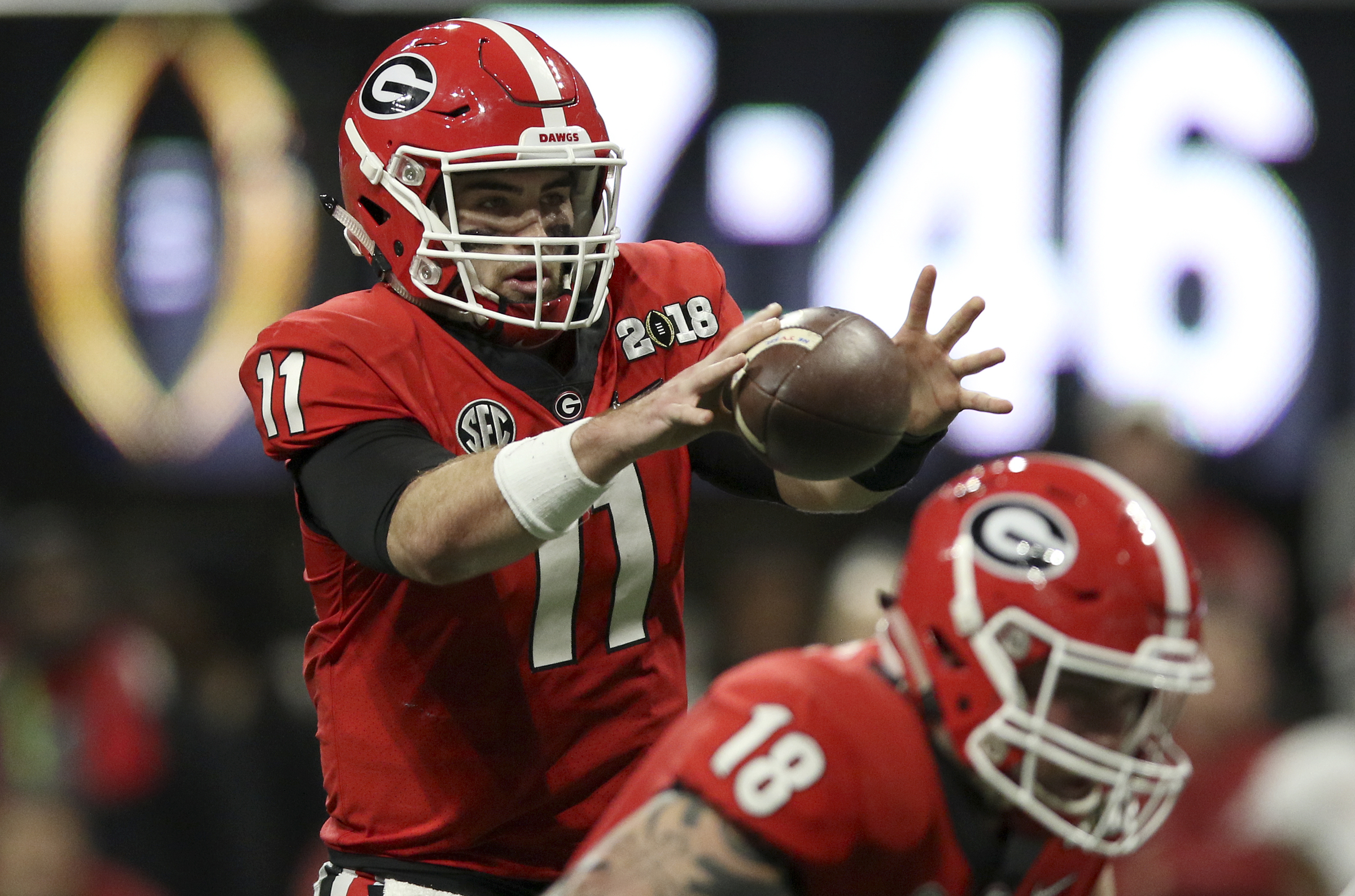 Georgia quarterback Jake Fromm (11) takes the snap against Alabama during the College Football Playoff national championship at Mercedes-Benz Stadium on Monday, Jan. 8, 2018 in Atlanta, Ga.