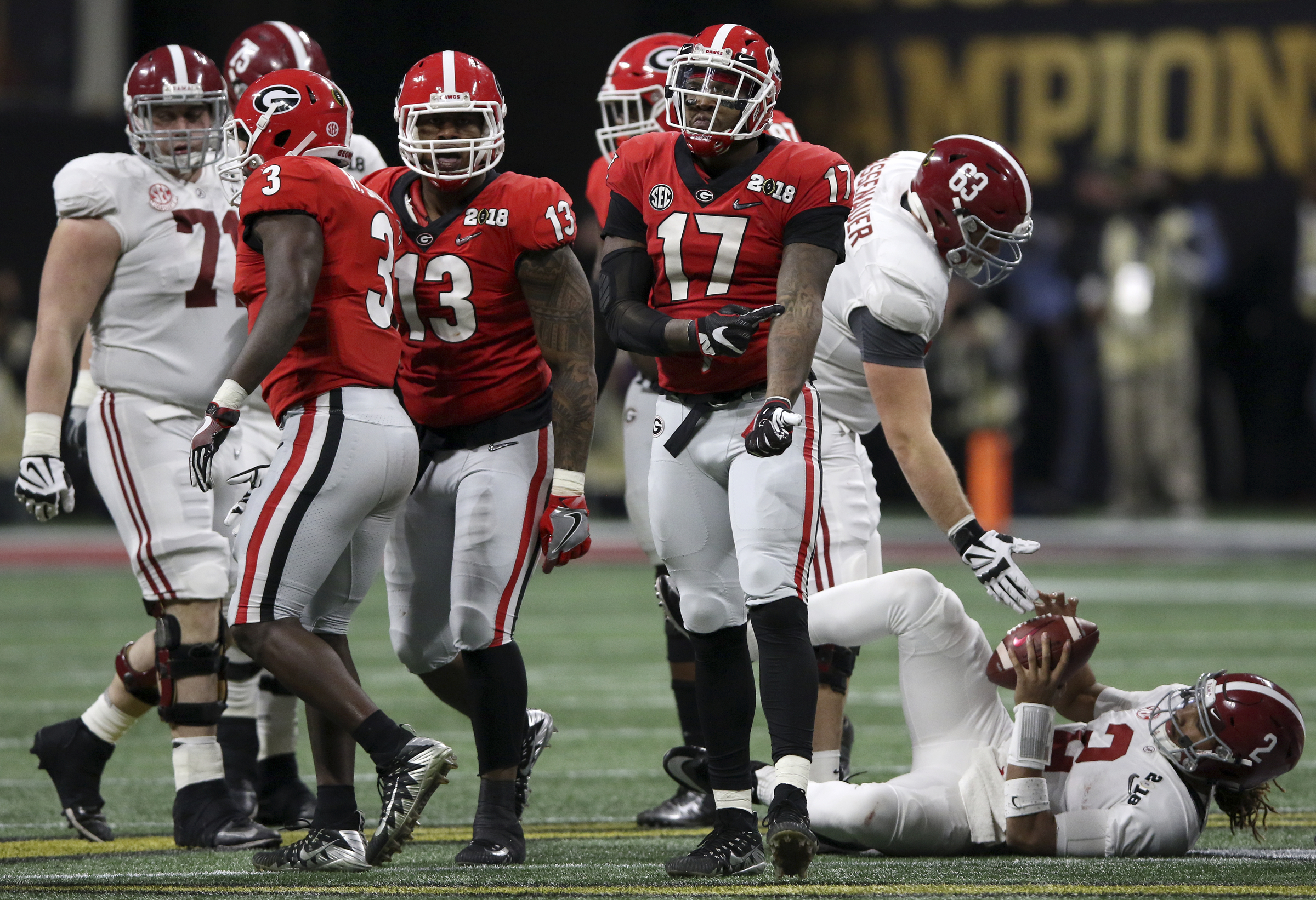 Georgia linebacker Davin Bellamy (17) celebrates after sacking Alabama quarterback Jalen Hurts (2) for a 6-yard loss during the College Football Playoff national championship at Mercedes-Benz Stadium on Monday, Jan. 8, 2018 in Atlanta, Ga.